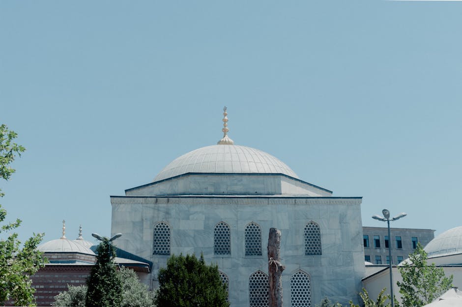 Beautiful marble mosque with a dome in İstanbul, viewed on a clear sunny day